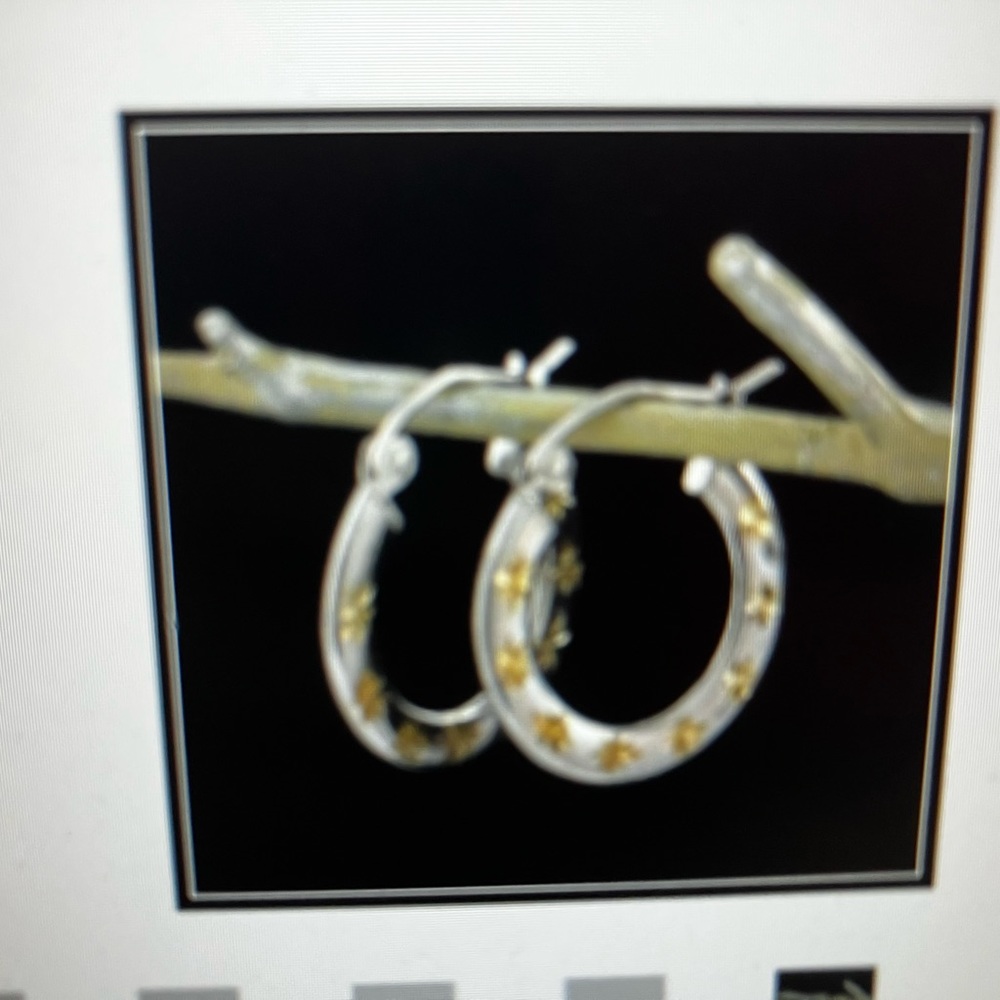 10k two tone earrings. Yellow and white gold 0.8 gram weight. 20 mm length.